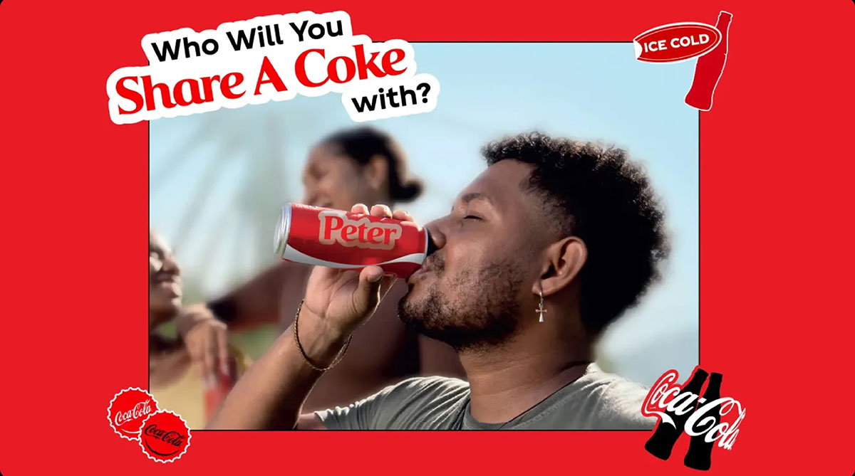 Man drinking from a red Coca-Cola can printed with the name Peter under the headline Who Will You Share A Coke With